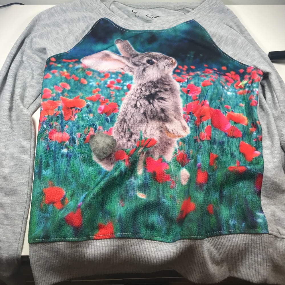 I’m selling a colorful sweater fit for anyone.